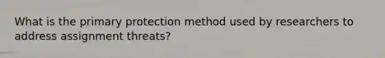 What is the primary protection method used by researchers to address assignment threats?