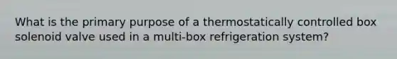 What is the primary purpose of a thermostatically controlled box solenoid valve used in a multi-box refrigeration system?