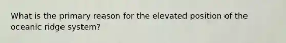 What is the primary reason for the elevated position of the oceanic ridge system?