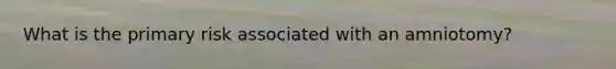 What is the primary risk associated with an amniotomy?