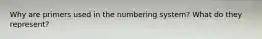 Why are primers used in the numbering system? What do they represent?