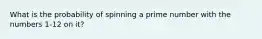 What is the probability of spinning a prime number with the numbers 1-12 on it?