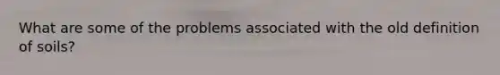 What are some of the problems associated with the old definition of soils?