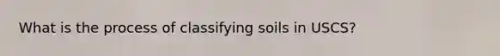 What is the process of classifying soils in USCS?