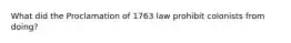 What did the Proclamation of 1763 law prohibit colonists from doing?