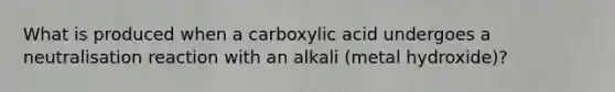 What is produced when a carboxylic acid undergoes a neutralisation reaction with an alkali (metal hydroxide)?