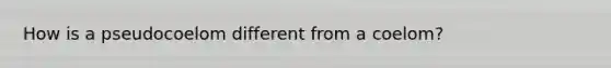 How is a pseudocoelom different from a coelom?