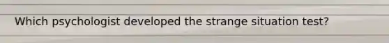 Which psychologist developed the strange situation test?