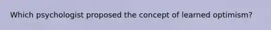 Which psychologist proposed the concept of learned optimism?