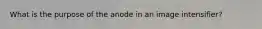 What is the purpose of the anode in an image intensifier?