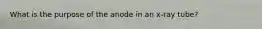 What is the purpose of the anode in an x-ray tube?