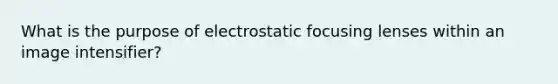 What is the purpose of electrostatic focusing lenses within an image intensifier?