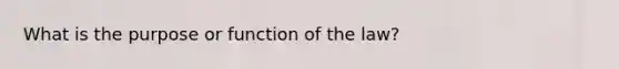 What is the purpose or function of the law?