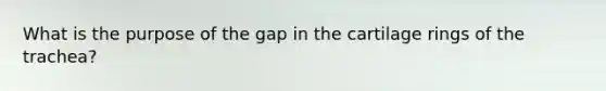 What is the purpose of the gap in the cartilage rings of the trachea?