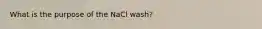 What is the purpose of the NaCl wash?