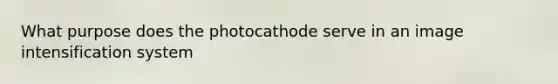 What purpose does the photocathode serve in an image intensification system