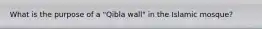 What is the purpose of a "Qibla wall" in the Islamic mosque?