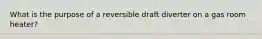 What is the purpose of a reversible draft diverter on a gas room heater?