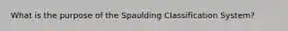 What is the purpose of the Spaulding Classification System?