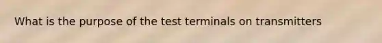 What is the purpose of the test terminals on transmitters