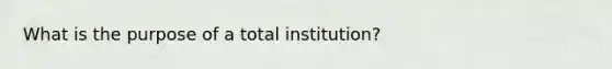 What is the purpose of a total institution?