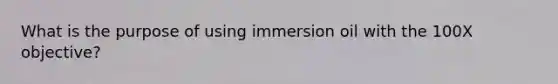 What is the purpose of using immersion oil with the 100X objective?