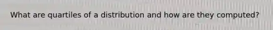 What are quartiles of a distribution and how are they computed?