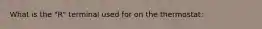 What is the "R" terminal used for on the thermostat: