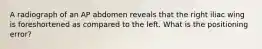 A radiograph of an AP abdomen reveals that the right iliac wing is foreshortened as compared to the left. What is the positioning error?