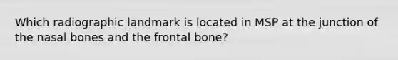 Which radiographic landmark is located in MSP at the junction of the nasal bones and the frontal bone?