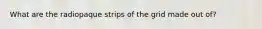What are the radiopaque strips of the grid made out of?
