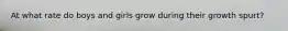 At what rate do boys and girls grow during their growth spurt?