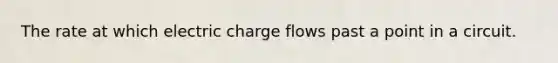 The rate at which electric charge flows past a point in a circuit.