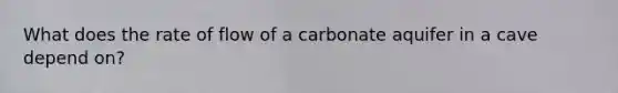 What does the rate of flow of a carbonate aquifer in a cave depend on?