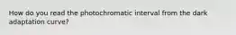 How do you read the photochromatic interval from the dark adaptation curve?