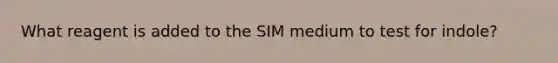 What reagent is added to the SIM medium to test for indole?