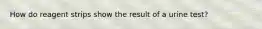 How do reagent strips show the result of a urine test?