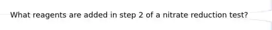 What reagents are added in step 2 of a nitrate reduction test?