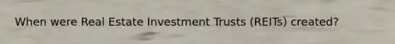 When were Real Estate Investment Trusts (REITs) created?