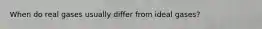 When do real gases usually differ from ideal gases?