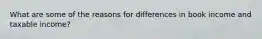 What are some of the reasons for differences in book income and taxable income?
