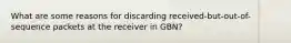 What are some reasons for discarding received-but-out-of-sequence packets at the receiver in GBN?