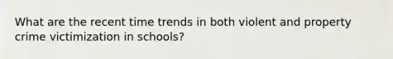 What are the recent time trends in both violent and property crime victimization in schools?