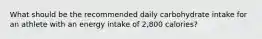 What should be the recommended daily carbohydrate intake for an athlete with an energy intake of 2,800 calories?