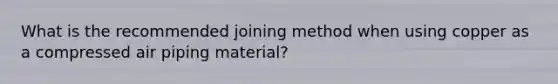 What is the recommended joining method when using copper as a compressed air piping material?