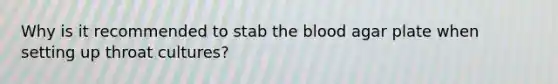 Why is it recommended to stab the blood agar plate when setting up throat cultures?