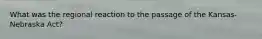 What was the regional reaction to the passage of the Kansas-Nebraska Act?
