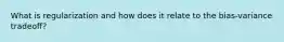 What is regularization and how does it relate to the bias-variance tradeoff?