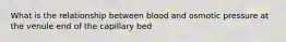 What is the relationship between blood and osmotic pressure at the venule end of the capillary bed