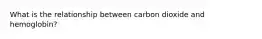 What is the relationship between carbon dioxide and hemoglobin?